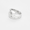 Modernistischer Ring aus Weißgold mit geometrischem Motiv und Diamant