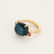 Pomellato - Bahia - Ring aus Roségold mit blauem Topas und facettierten rosa Saphiren.