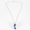Chain and Pendant in white gold, lapis lazuli, and small diamonds.
