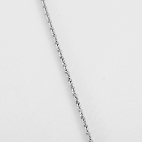 Chain and Pendant in white gold, lapis lazuli, and small diamonds.
