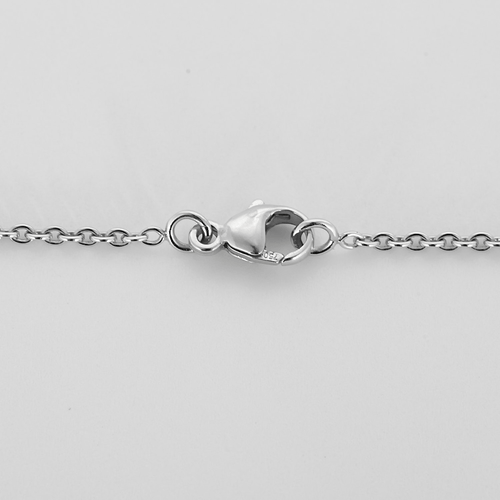 Chain and Pendant in white gold, lapis lazuli, and small diamonds.