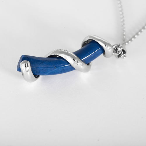 Chain and Pendant in white gold, lapis lazuli, and small diamonds.