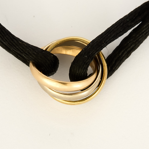 Cartier - Trinity 18K three-gold bracelet and cord