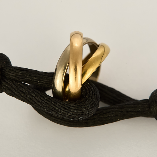 Cartier - Trinity 18K three-gold bracelet and cord