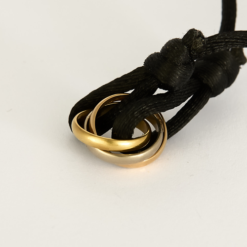 Cartier - Trinity 18K three-gold bracelet and cord