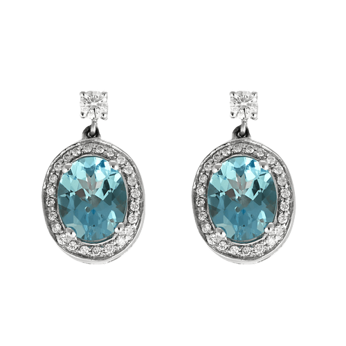 Pair of earrings in white gold, topaz, and diamonds