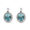 Pair of earrings in white gold, topaz, and diamonds