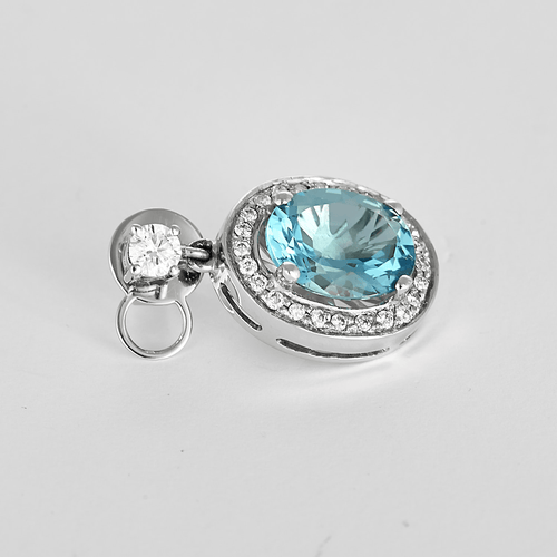 Pair of earrings in white gold, topaz, and diamonds