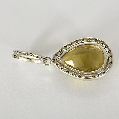 Pair of earrings in white gold, lemon quartz and diamonds