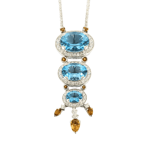 Collar de oro gris, diamantes y topacios azules, citrinos