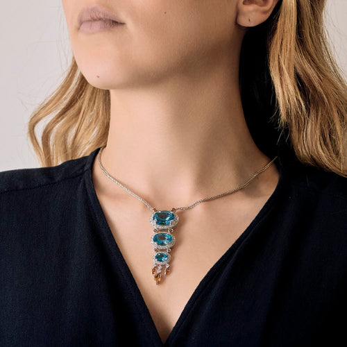Collar de oro gris, diamantes y topacios azules, citrinos