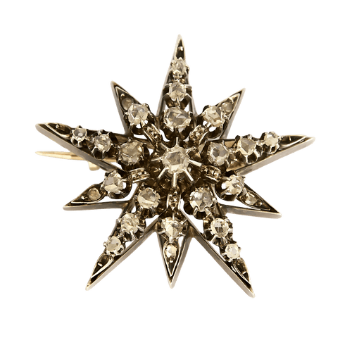 Elegant Napoleon III period brooch in rose gold doubled with silver featuring a star motif