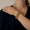 Elegant ribbon bracelet in yellow gold