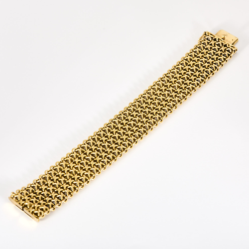 Elegant ribbon bracelet in yellow gold