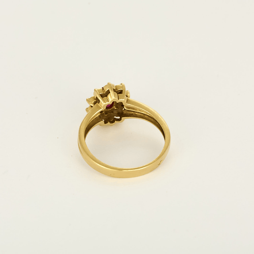 Ring Daisy in yellow gold, ruby: 0.50 carat and diamonds: 0.10 carat