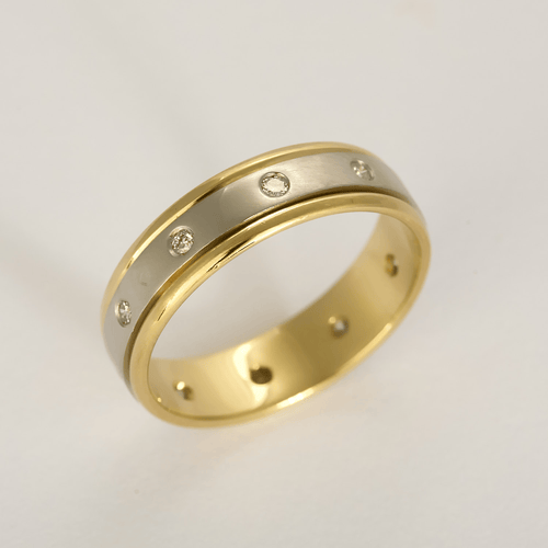Elegantní prsten z žlutého a bílého zlata, diamanty: 0,45 karátu