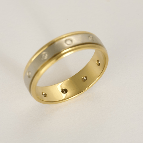 Elegantní prsten z žlutého a bílého zlata, diamanty: 0,45 karátu