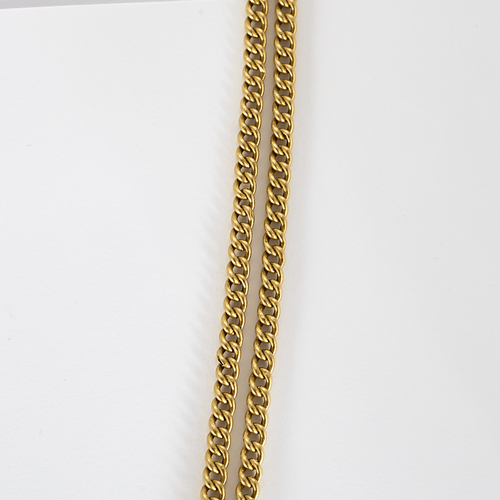 Collier en or jaune à maille gourmette et pendentif filigrané à motif de fleur 58 Facettes DV32806-5