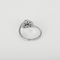 Volutenring aus Graugold und Diamanten