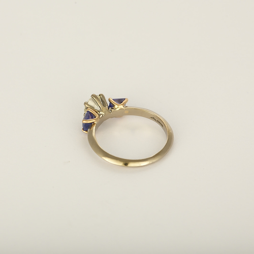 Anillo de oro blanco y rosa de 18k Diamante y tanzanita