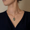 Yellow gold and aquamarine pendant: 15 carats