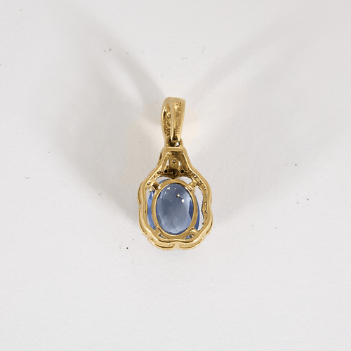 Yellow gold, diamond and sapphire pendant: 1.50 carat