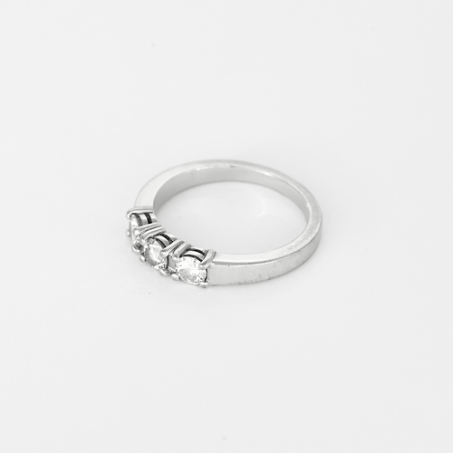 Armbandring i vitguld, tre briljantslipade diamanter