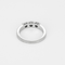 Armbandring i vitguld, tre briljantslipade diamanter