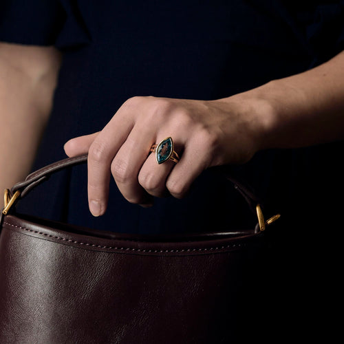 Yellow gold and topaz ring