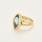 Yellow gold and topaz ring