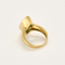 Yellow gold and topaz ring