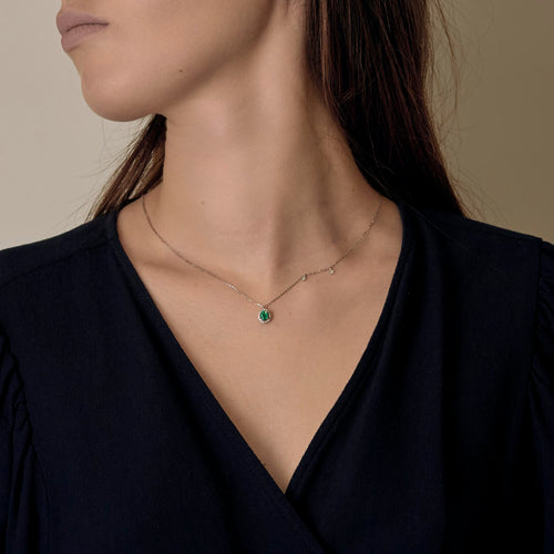 White gold, emerald and diamond necklace
