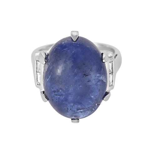 Large white gold, tanzanite and diamond ring: 0.08 carat
