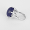 Large white gold, tanzanite and diamond ring: 0.08 carat