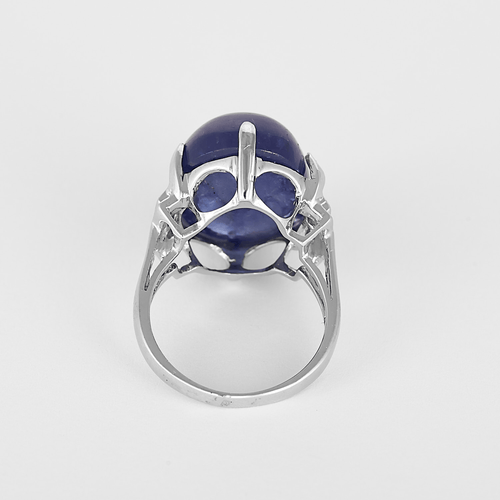 Large white gold, tanzanite and diamond ring: 0.08 carat