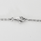Chanel - Camélia - Halskæde i hvidguld, diamanter: 0,20 carat og onyx