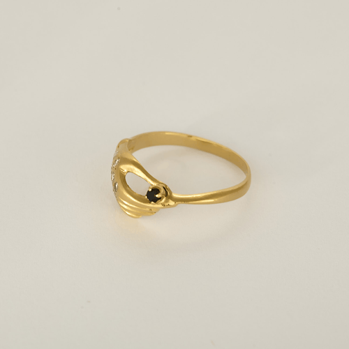 Anello in oro giallo con motivo di mano stilizzata, zaffiro e diamanti: 0,10 carati