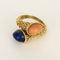 Bague 54 Bague Toi et moi en or jaune, lapis lazuli et corail rose 58 Facettes
