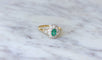 https://cdn.shopify.com/s/files/1/0075/4588/0666/products/bague-雏菊-emeraude-et-diamants-sur-or-124242.jpg?v=1685598211