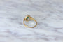 https://cdn.shopify.com/s/files/1/0075/4588/0666/products/bague-雏菊-emeraude-et-diamants-sur-or-929718.jpg?v=1685598211