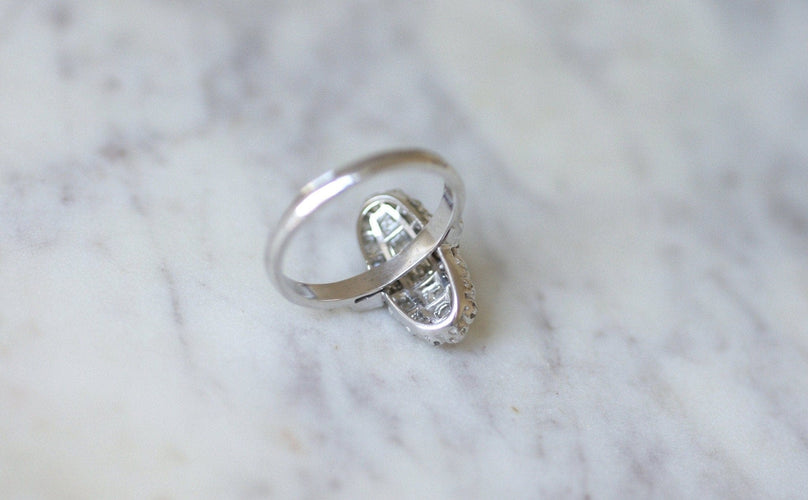 https://cdn.shopify.com/s/files/1/0075/4588/0666/products/bague-marquise-ancienne-diamants-916538.jpg?v=1678521525