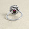 Bague 52 Bague en or blanc 18 carats avec rubis ovale et diamants 58 Facettes OC-61200079