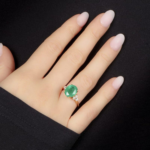 Bague 55 Bague en or jaune 18 carats avec émeraude et diamants 58 Facettes 61600013