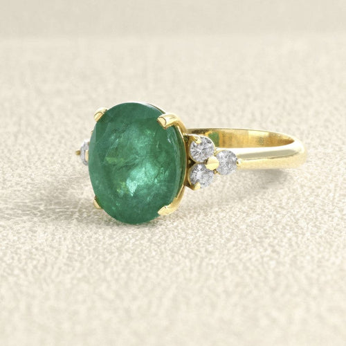 Bague 55 Bague en or jaune 18 carats avec émeraude et diamants 58 Facettes 61600013