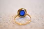 https://www.noircarat.fr/wp-content/uploads/2024/12/bague-pierre-bleue.jpg