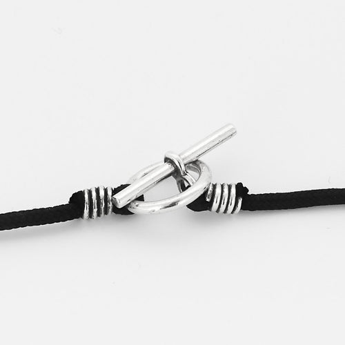 Hermès - Chaîne d'ancre - Colgante redondo en plata y cordón de algodón negro 