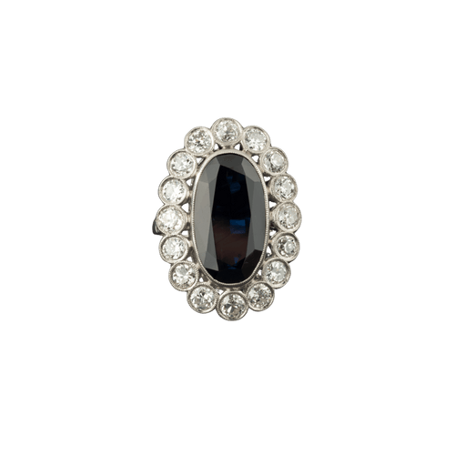 Bague 51 Bague marguerite sertie d’un saphir ovale en platine et diamants 58 Facettes