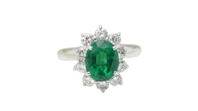 Bague 53 Bague entourage en or blanc 18 kt, émeraude de Zambie et diamants 58 Facettes 32690