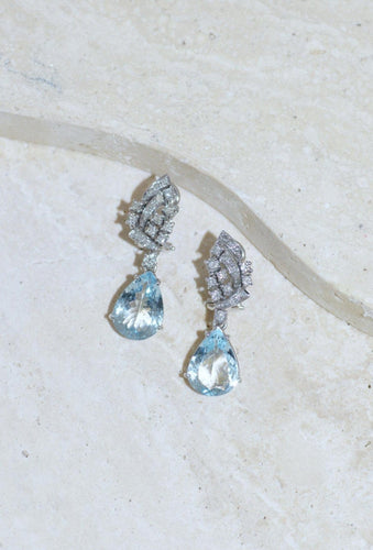 https://cdn.shopify.com/s/files/1/0075/4588/0666/files/boucles-doreilles-goutte-aigue-marine-et-diamant-5424663.jpg?v=1758624768