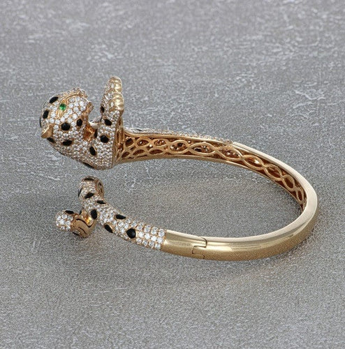 Bracelet Bracelet panthère en or jaune 18 carats, onyx, émeraudes et diamants 58 Facettes 62000207